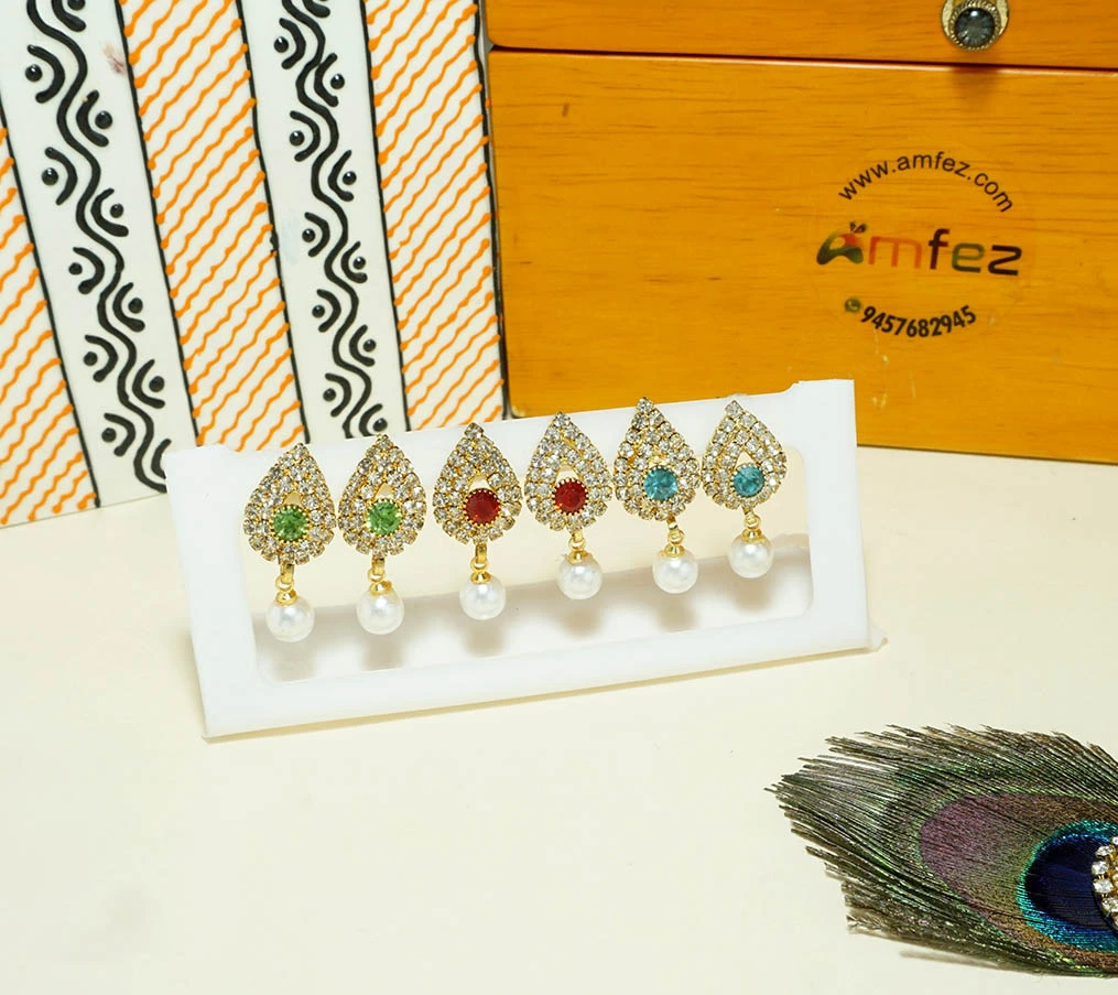 A Set of Three Multi Stone Pearl Work Ear Rings