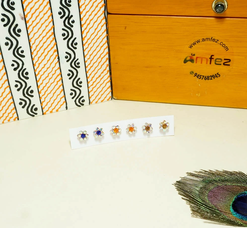 A Set of Three Multi Stone Pearl Work Ear Rings