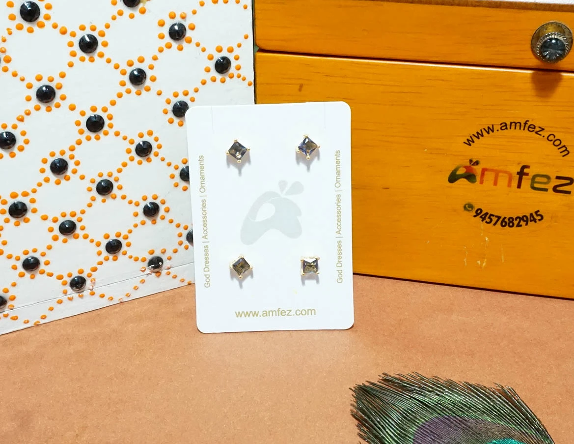 A Pair of Two Purple AD Stone Stud Ear Rings ( Medium )