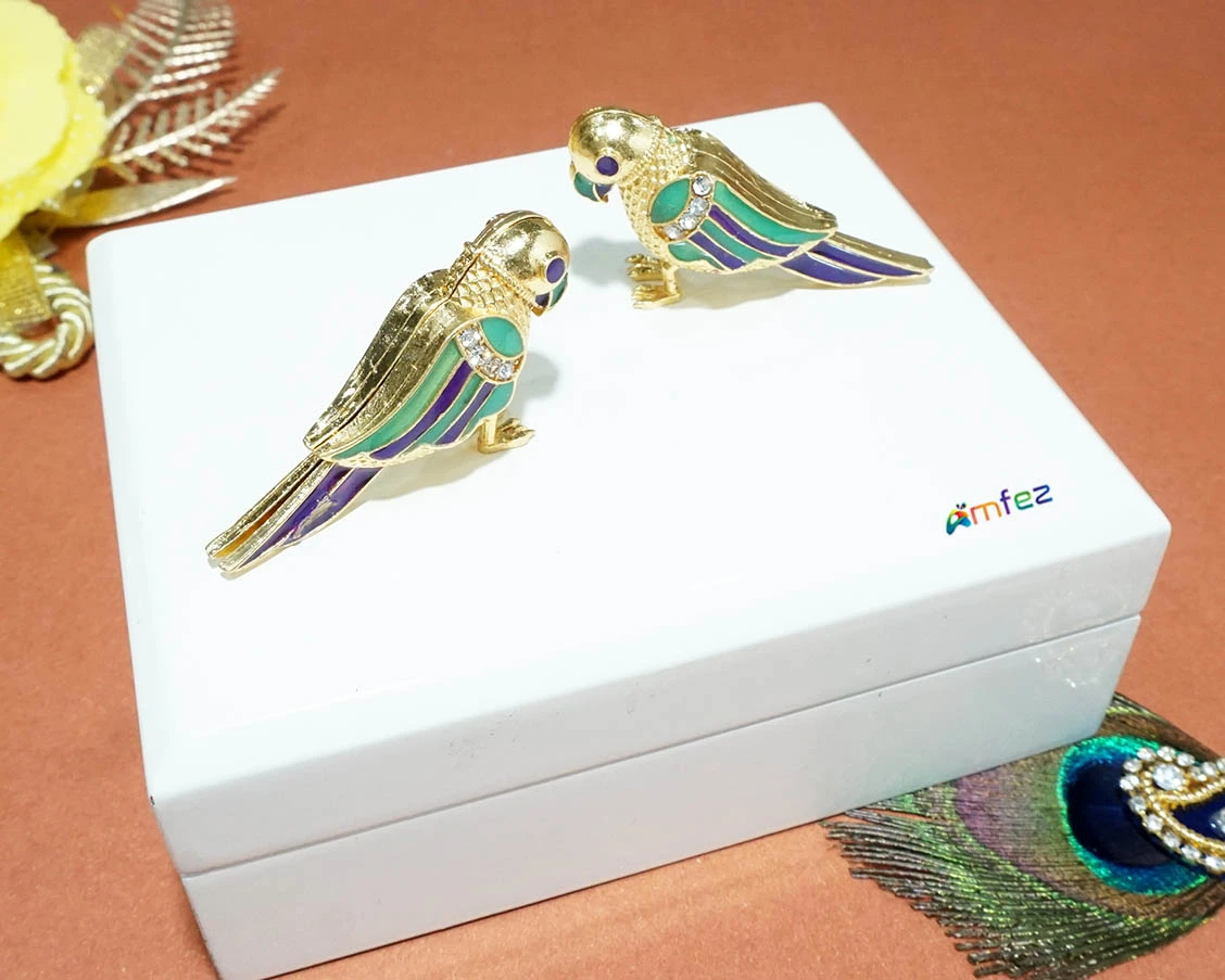 A Pair of Golden Meenakari Work Alloy Parrot Toy