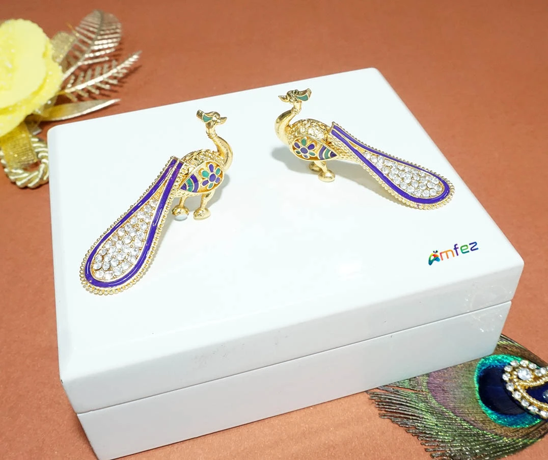 A Pair of Golden Meenakari Work Alloy Peacock Toy
