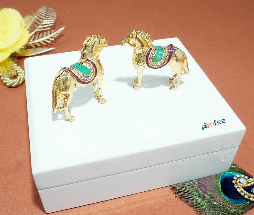 A Pair of Golden Meenakari Work Alloy Horse Toy