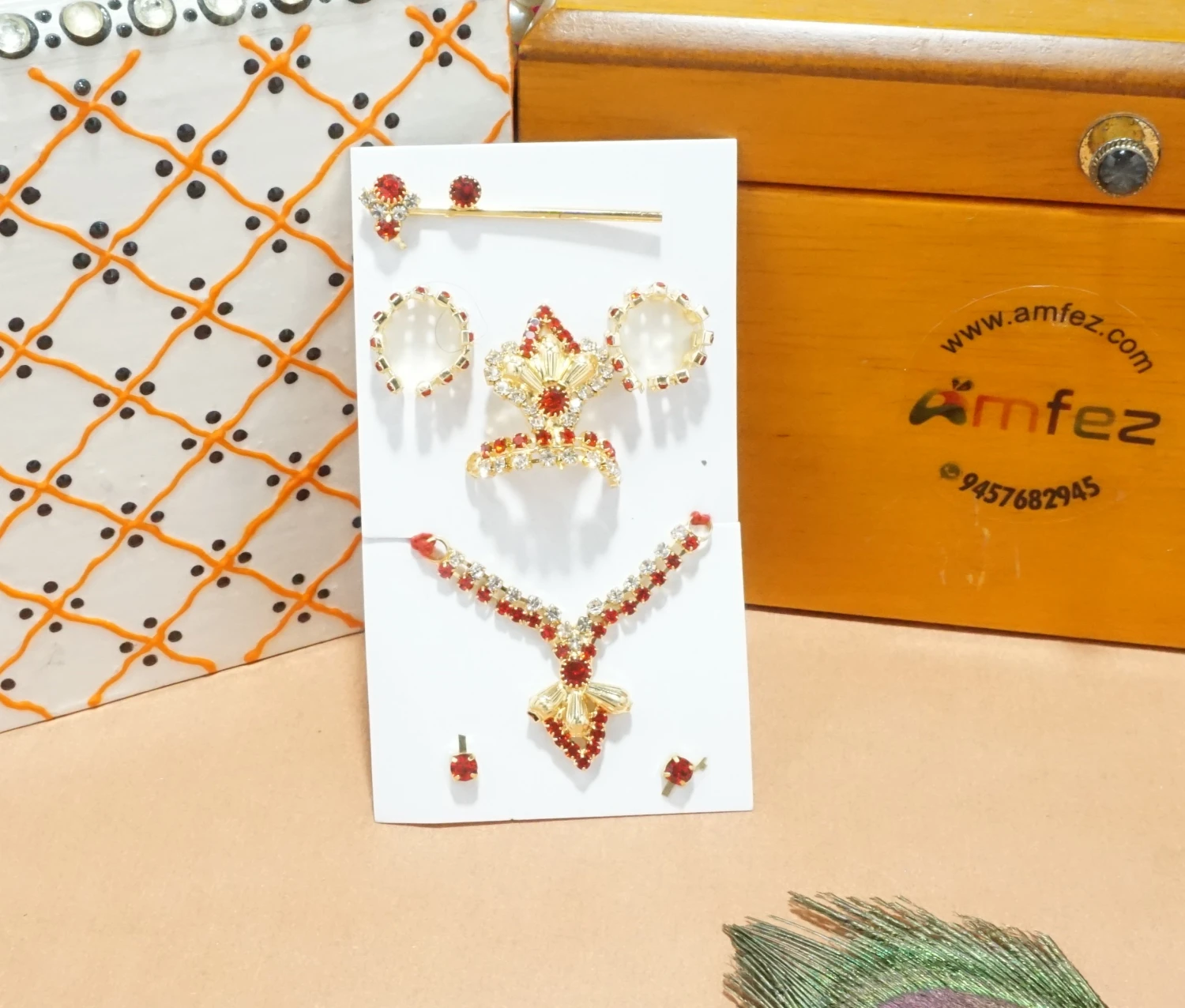 A Pack of Red Stone Work Mukut Mala Set With Flute, Earrings & Bracelets