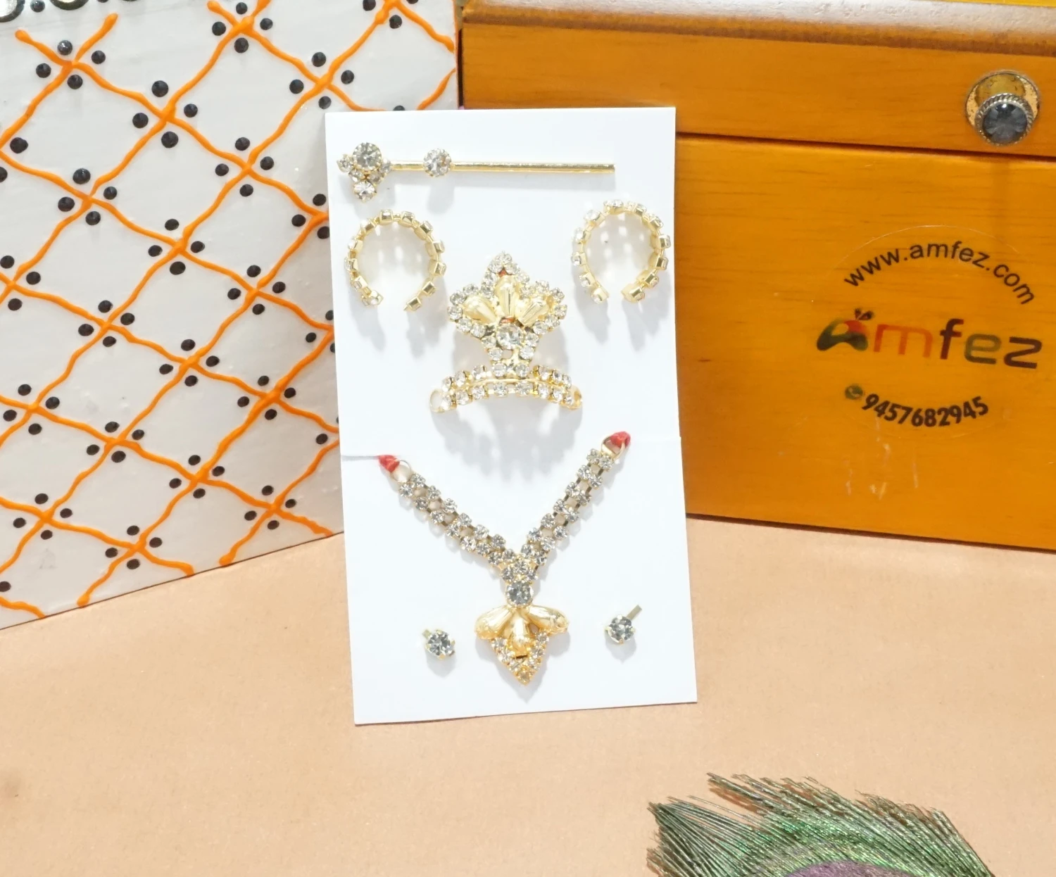 A Pack of White Stone Work Mukut Mala Set With Flute, Earrings & Bracelets